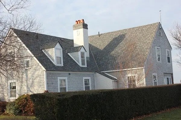 Chimney on a shingled cape home