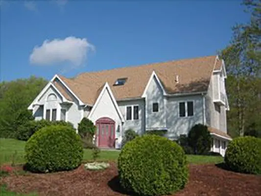 Home with new cedar-toned roof