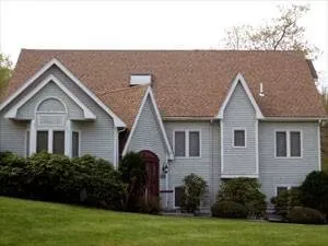 Home with new brown shingle roof