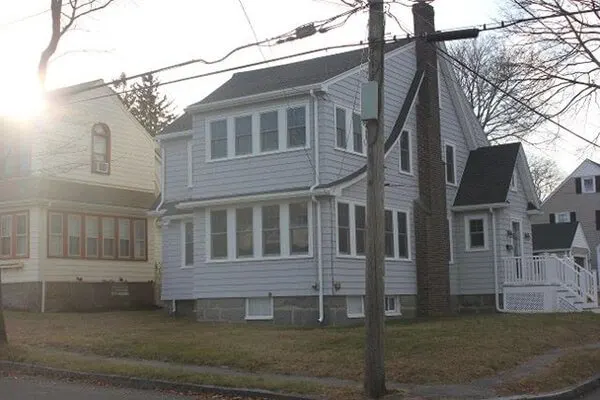 Exterior roof repair on a New England home